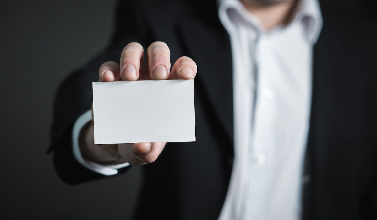 A criminal defense lawyer holding a blank paper, representing identity theft.